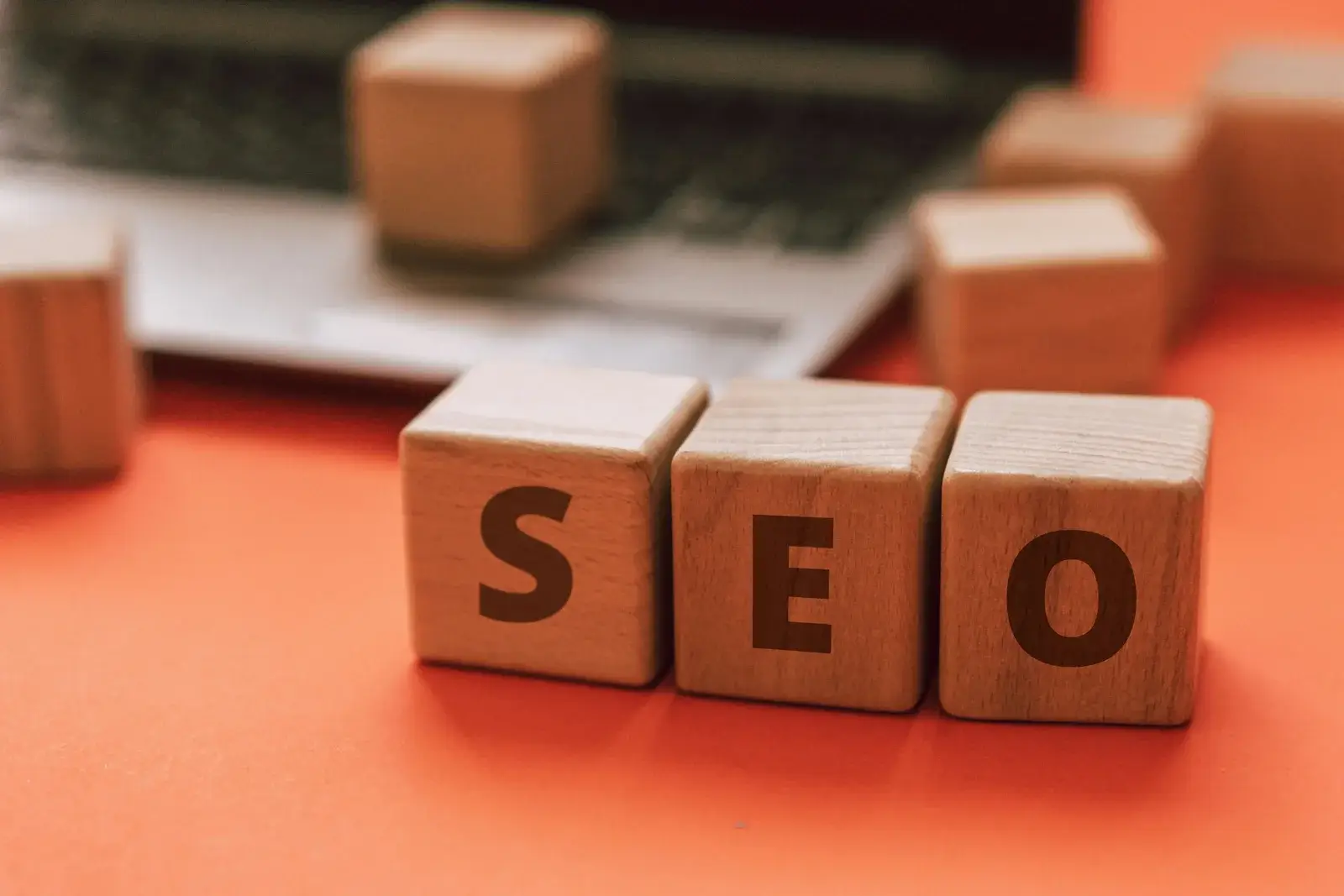 Wooden blocks spelling SEO representing basic SEO concepts for 2026