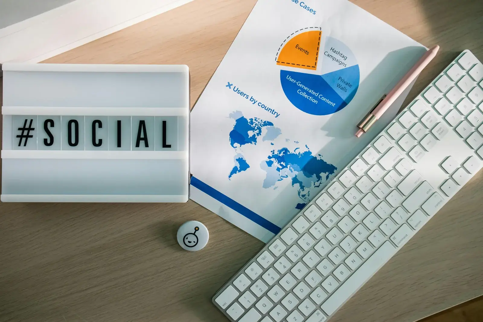 Marketing documents and keyboard on a desk representing digital marketing planning