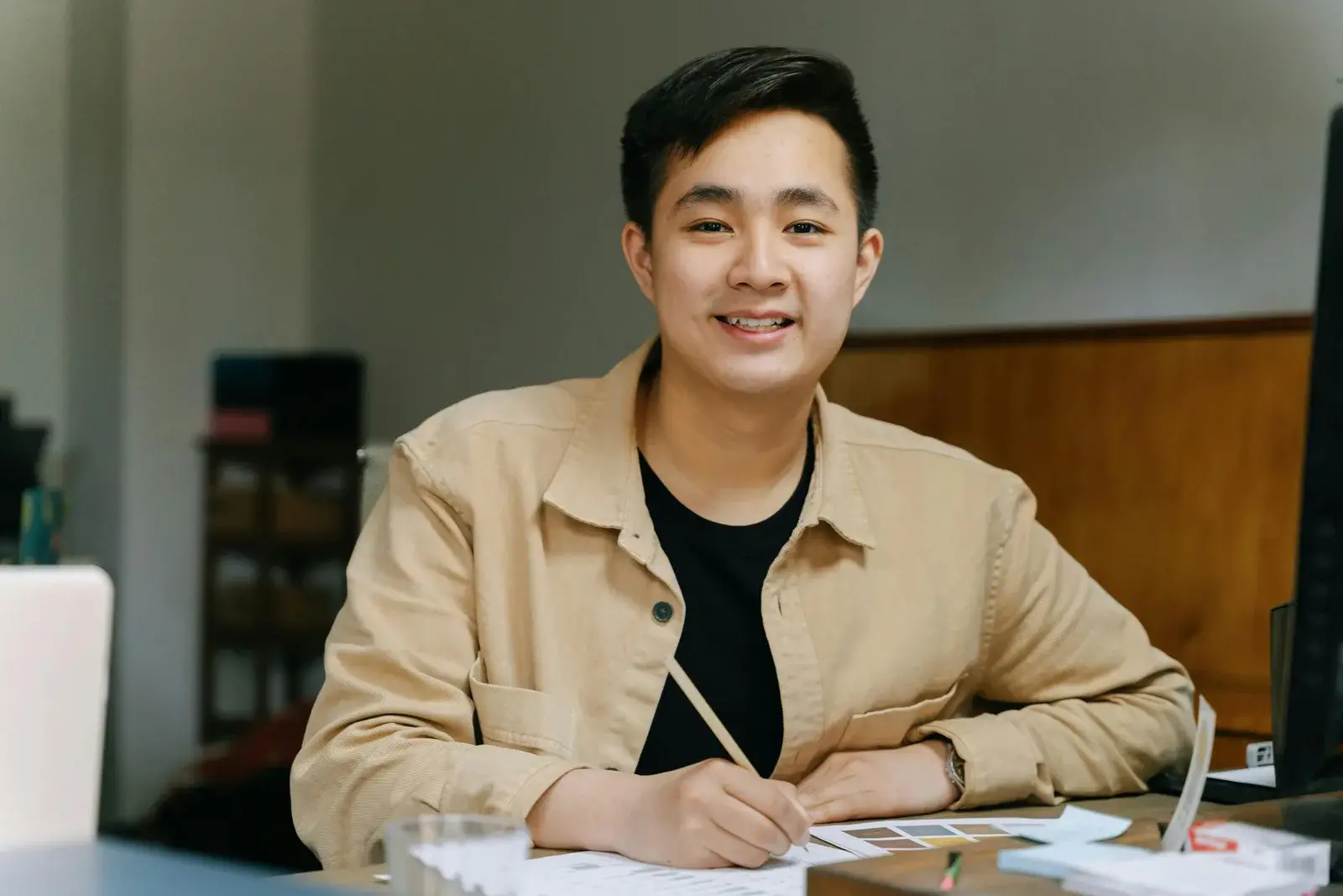 Man writing notes for content marketing strategy and planning